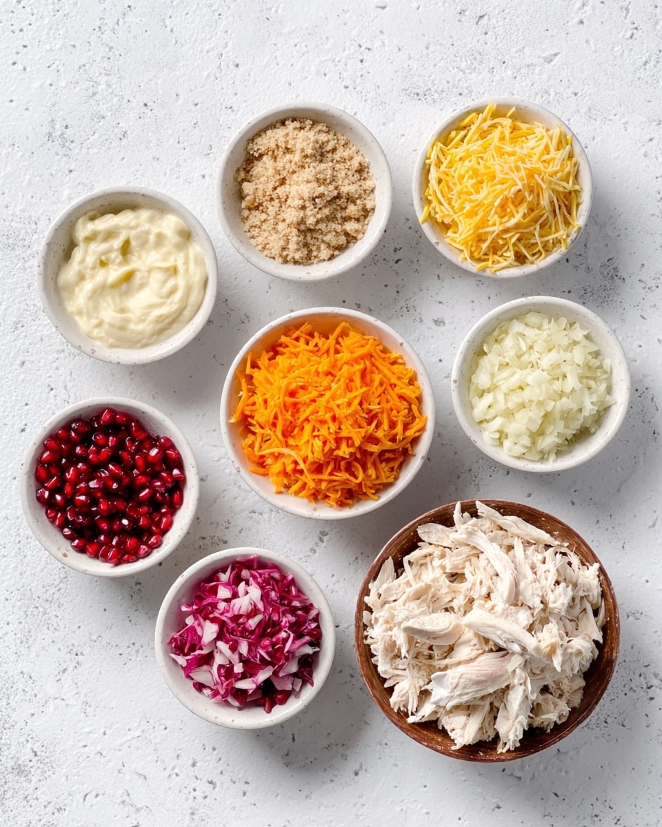 The image shows eight small white bowls arranged on a white marbled surface. Each bowl contains a different ingredient: one has light brown crumbs, another has thick white sauce, a third is filled with yellow shredded cheese, a fourth holds orange shredded carrots, and a fifth contains finely chopped white pieces. Another bowl has small red pomegranate seeds, one more holds finely chopped white garlic, and the last one contains finely chopped pinkish-red cabbage. A larger brown bowl holds a large amount of shredded white chicken in the bottom right corner. photo taken with an iphone --ar 4:5 --v 7