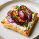 Cheese Plum Tart with Caramelized Onions and Fresh Basil Recipe
