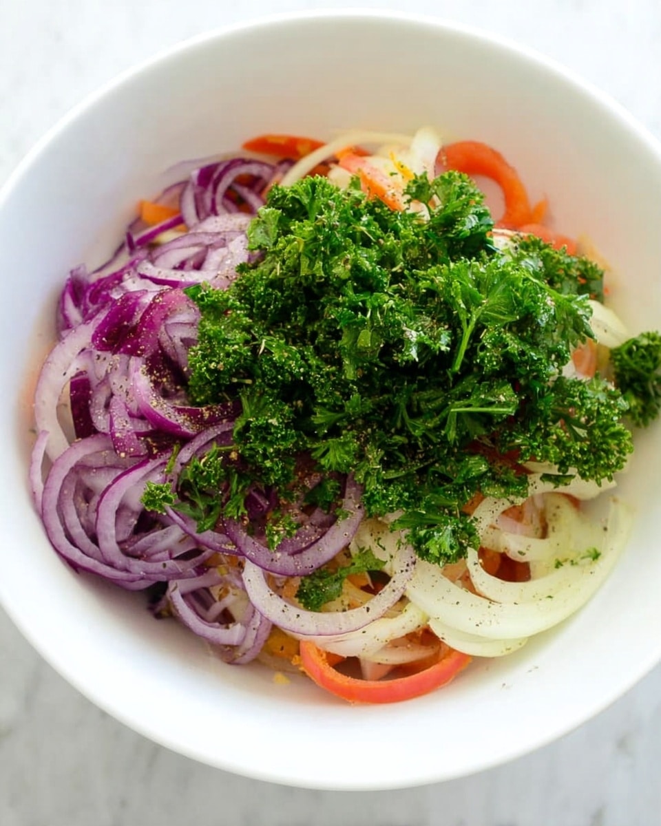 A white bowl holds a mix of sliced vegetables and herbs in layers, starting with thin rings of orange and white at the bottom, likely carrot and fennel. On top of this is a layer of thinly sliced purple onion rings that are slightly curled. The top layer is a generous pile of fresh green curly parsley, with fine specks of black pepper sprinkled over the vegetables. The background is a white marbled texture. Photo taken with an iphone --ar 4:5 --v 7
