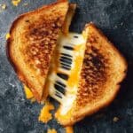 Perfectly Crispy Grilled Cheese Sandwich with Sharp Cheddar and Gruyère Recipe
