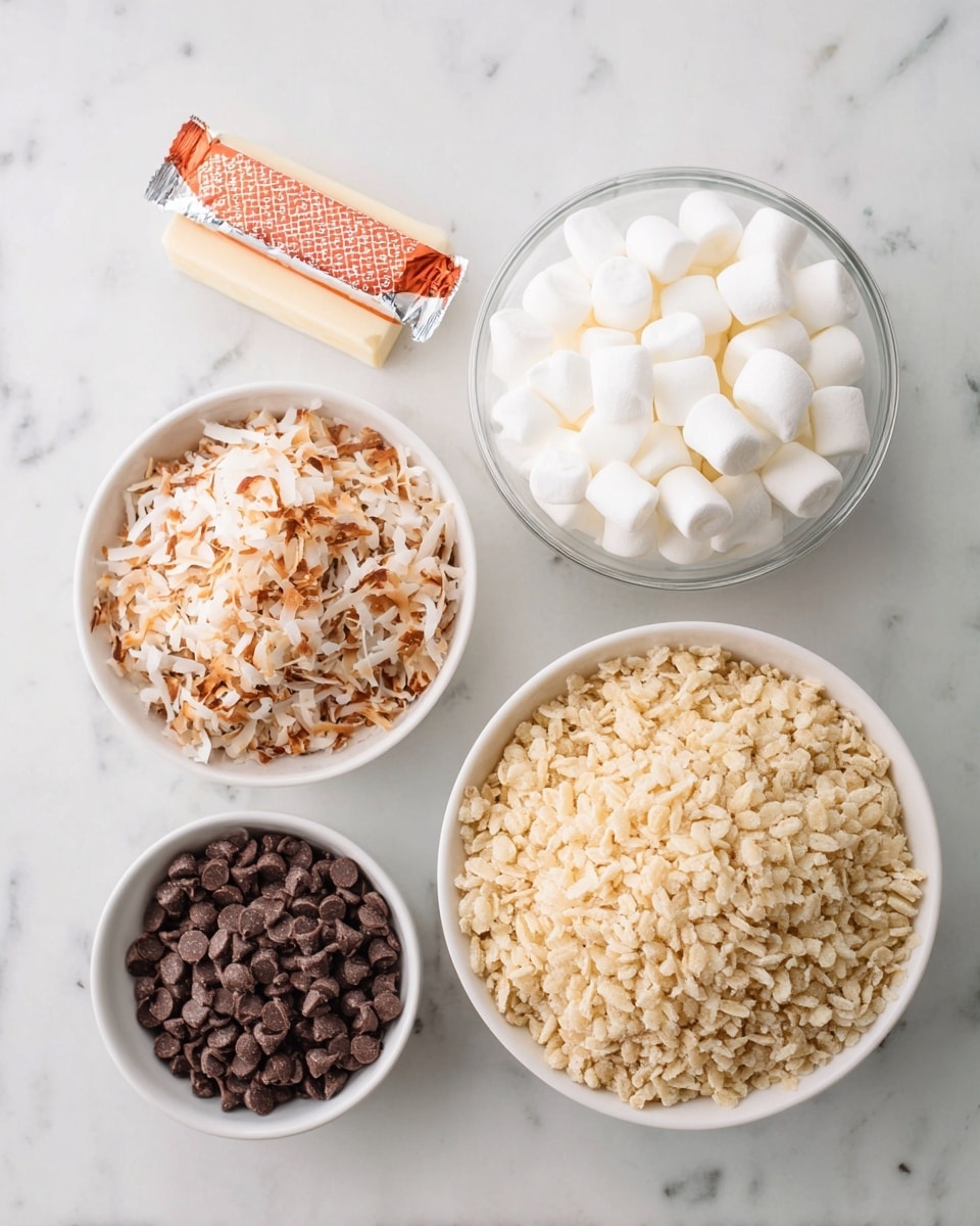 The image shows four white bowls and a foil-wrapped stick of butter on a white marbled surface. The largest white bowl at the bottom right is filled with light beige crispy rice cereal that has a rough texture. Above it on the top right, there is a clear bowl filled with small, fluffy white mini marshmallows. To the left of the marshmallows, a white bowl holds toasted shredded coconut that is a mix of light and dark brown shades with a crispy texture. Below that, a smaller white bowl contains dark brown chocolate chips with a smooth, shiny surface. The stick of butter wrapped in orange and white foil is placed near the top center. photo taken with an iphone --ar 4:5 --v 7