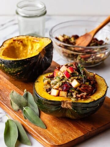 Stuffed Acorn Squash with Wild Rice, Mushrooms, Apples, and Cranberries Recipe