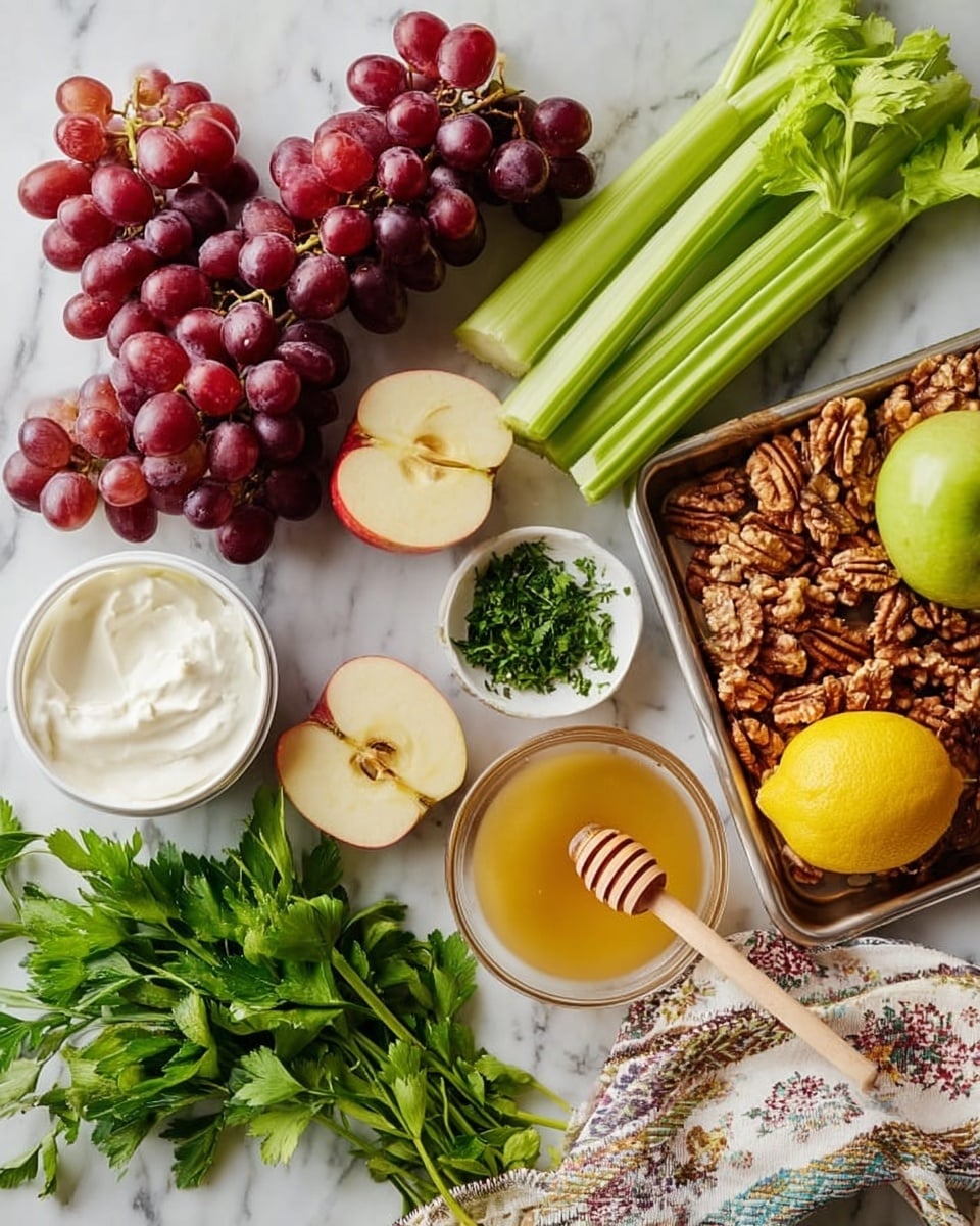 The image shows fresh ingredients arranged on a white marbled surface. A cluster of red grapes with shiny skins is on the left, next to a bunch of bright green celery stalks with leaves. Two halves of a red apple with white inside sit nearby, along with a whole green apple. Small bowls contain chopped green herbs and creamy white sauce. A white container of soft cheese or cream is in front, with some green parsley around it. On the right, a metal tray holds a bowl of golden honey with a honey dipper, a bright yellow lemon, and a pile of walnuts all spread out. A patterned cloth is partially visible at the bottom right corner. Photo taken with an iphone --ar 4:5 --v 7