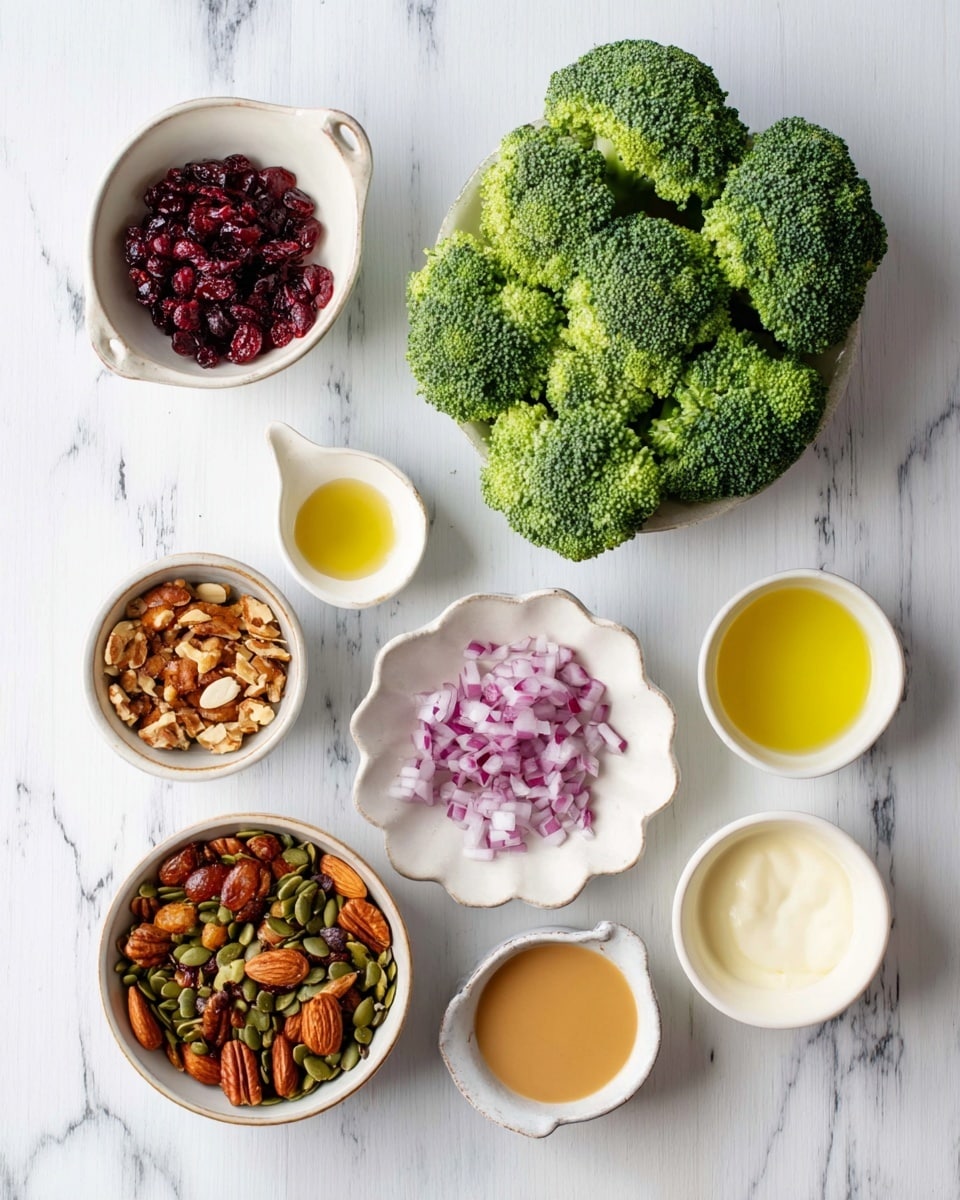The image shows fresh broccoli florets placed at the top center on a white marbled textured surface. Below the broccoli, there are small white bowls arranged in a loose circle: a bowl with red dried cranberries on the left, a scalloped white bowl with chopped purple onions next to it, and small white bowls with yellow oil, light brown liquid, light beige paste, golden syrup, and thick white cream scattered around. At the bottom left, there is a round bowl with mixed nuts and seeds, mainly almonds and pumpkin seeds, showing rich brown and green colors. All items are spaced neatly on the white marbled surface, creating a clean and bright layout. photo taken with an iphone --ar 4:5 --v 7