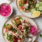 Baked Falafel with Hummus, Fresh Veggies, and Tahini Sauce Recipe