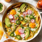 Quick and Delicious Chilaquiles with Fried Eggs and Fresh Toppings Recipe