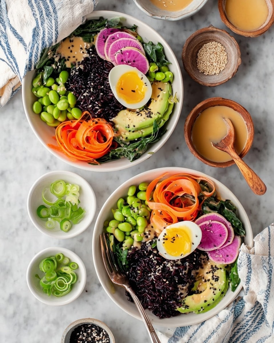 The image shows two white bowls filled with colorful fresh salad bowls on a white marbled surface. Each bowl has a base layer of dark black rice in the center, surrounded by green leafy spinach on one side and bright green edamame beans on the other. There are thin round slices of purple radishes layered on top of the rice. One side of the bowls has orange carrot ribbons curled into spirals, while the other side has light green avocado slices with black sesame seeds sprinkled on them. A halved soft-boiled egg with a bright yellow yolk sits neatly beside the avocado. Drizzled light tan dressing and extra sesame seeds are sprinkled over the salad. There is a fork resting in each bowl. Around the bowls, there are small white dishes with sliced green onions, mixed sesame seeds in a small wooden bowl, a wooden spoon in a bowl of black rice, and a small bowl of tan-colored sauce with a wooden spoon. A woman's hand holds one of the salad bowls slightly, and a white and blue striped cloth napkin lies nearby. photo taken with an iphone --ar 4:5 --v 7
