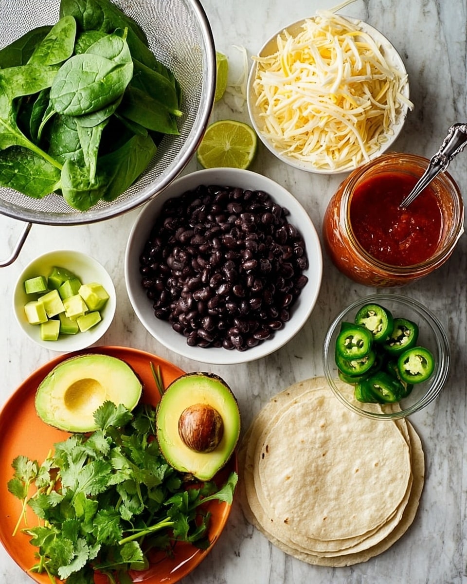 The image shows a white bowl full of black beans in the bottom left, next to an orange plate holding a halved avocado with the pit, lime halves, and cubed avocado in a small white bowl. In the top left, fresh green spinach leaves rest in a metal colander. To the right is a white plate with shredded white and yellow cheese, sliced green jalapeños in a small glass bowl, fresh cilantro, and stacked white corn tortillas. A jar of red sauce with a metal spoon beside it is placed near the top right, all set on a white marbled surface photo taken with an iphone --ar 4:5 --v 7