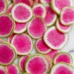 Watermelon Radish Buddha Bowl with Roasted Sweet Potatoes and Turmeric Tahini Sauce Recipe