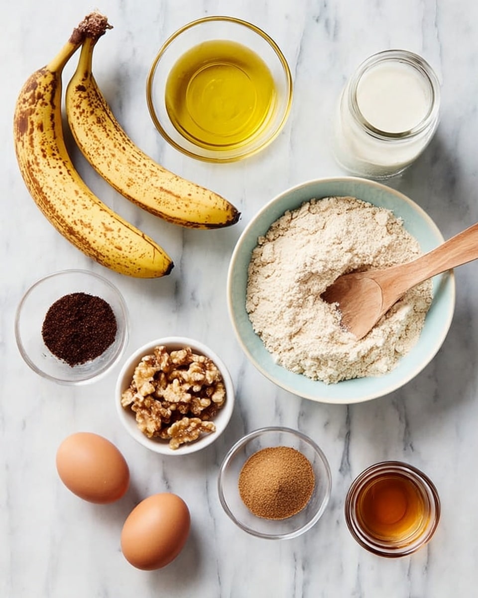 A white marbled surface holds various ingredients arranged neatly: at the top right, a white bowl with a pale blue inside rim contains a light beige flour mix with a wooden spoon resting inside; to its top left, a clear glass bowl filled with golden-yellow oil; below it, a small glass jar of white liquid, likely milk; two ripe bananas with brown spots lie diagonally on the left; near the bottom left are two brown eggs side by side; a small clear bowl of chopped light brown walnuts sits to the right of the eggs; a small white bowl with a cinnamon powder is placed above the walnuts and next to a larger white bowl filled with dark brown sugar; a very tiny clear bowl containing amber-colored liquid, possibly vanilla extract, is near the bottom-right side of the arrangement. photo taken with an iphone --ar 4:5 --v 7