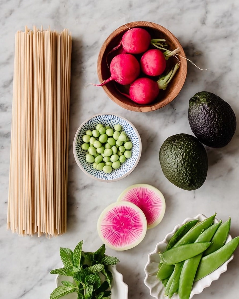 This image shows several fresh ingredients neatly arranged on a white marbled surface. On the left side, there are two bundles of light beige noodles stacked vertically. Above and to the right of them is a small wooden bowl holding four bright red radishes with green tops. Below the noodles is a small wooden bowl filled with light green shelled peas. To the right center of the image, there are two whole dark green avocados placed side by side. Above the avocados is a small white plate with a blue dotted edge holding some fresh green mint leaves. Below the mint plate, two round slices of watermelon radish are displayed with pink centers and white edges. Finally, on the bottom right corner, there is a small white scalloped dish filled with bright green snap peas. The photo taken with an iphone --ar 4:5 --v 7
