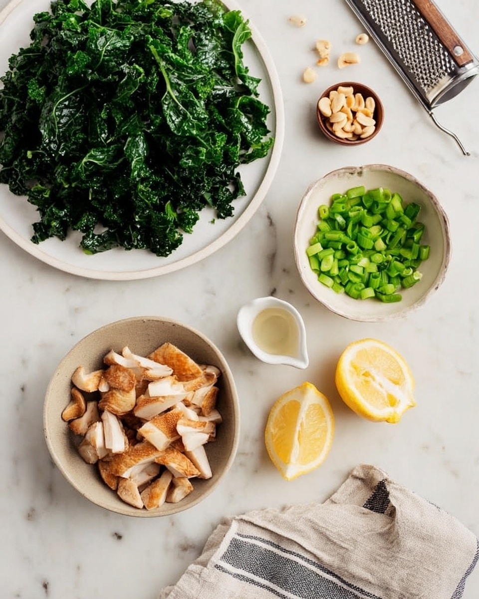 The image shows a simple food setup on a white marbled surface with five main parts: a white round plate filled with dark green, roughly chopped leafy kale towards the top left; a small white bowl holding bright green chopped scallions near the center right; a beige bowl toward the bottom center filled with sliced brown and white pieces of cooked mushrooms; a small white cup containing two lemon halves positioned to the bottom right; and a few scattered light tan macadamia nuts near the top right, next to a silver grater and a striped cloth. The colors are natural with green, brown, yellow, and white tones, and the setting is neat and bright. photo taken with an iphone --ar 4:5 --v 7