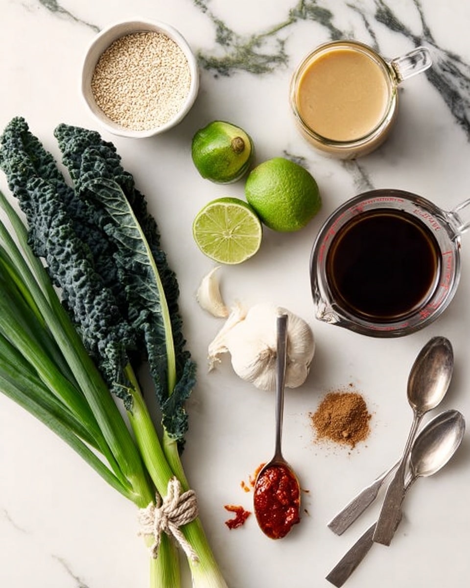 The image shows various fresh ingredients placed on a white marbled surface. On the left side, there is a small bunch of dark leafy kale tied together and beside it a bunch of green onions with long bright green stalks. In the center, there are two lime halves with a light green inside. Nearby, a whole white garlic bulb rests next to a small white bowl filled with a light yellow liquid. Above the garlic, a small jar contains a creamy beige sauce. To the upper right, a clear glass measuring cup holds a dark brown liquid. Two silver spoons lay side by side, one carrying a bright red chili paste, the other filled with a brown powder. In the top left corner, a small white bowl holds light beige sesame seeds. The background has a smooth white marbled look. Photo taken with an iphone --ar 4:5 --v 7